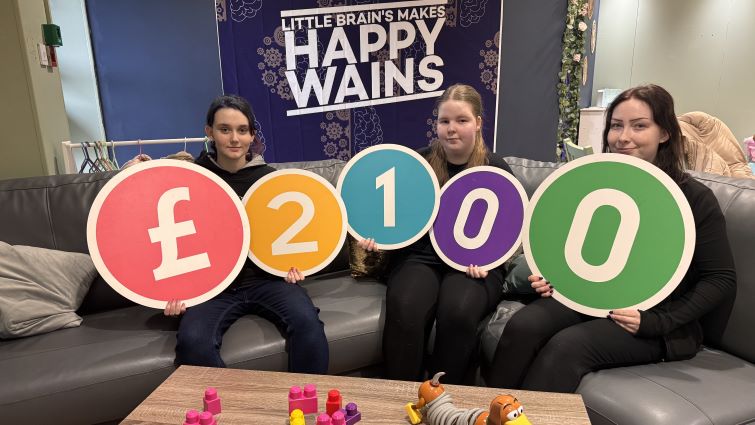 Children at the Little Brains resource in East Kilbride display the &pound;2100 received from the Participatory Budgeting Fund for a Regulation Room.