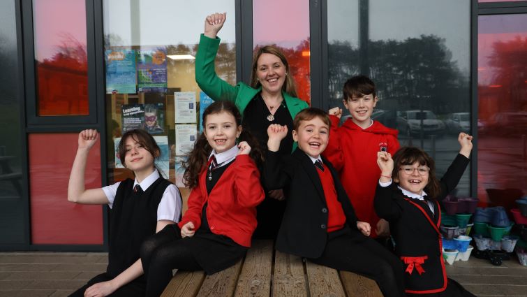 Acting Head Teacher at South Park PS, East Kilbride, Yvonne Donaldson, with pupils after their successful HMIe report.