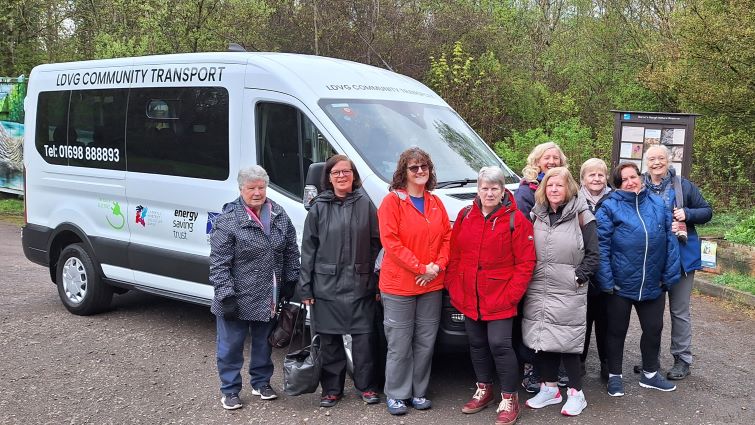 Members of LDVG's Walking Group beside the charity's minibus at Baron's Haugh Nature Reserve, Motherwell.