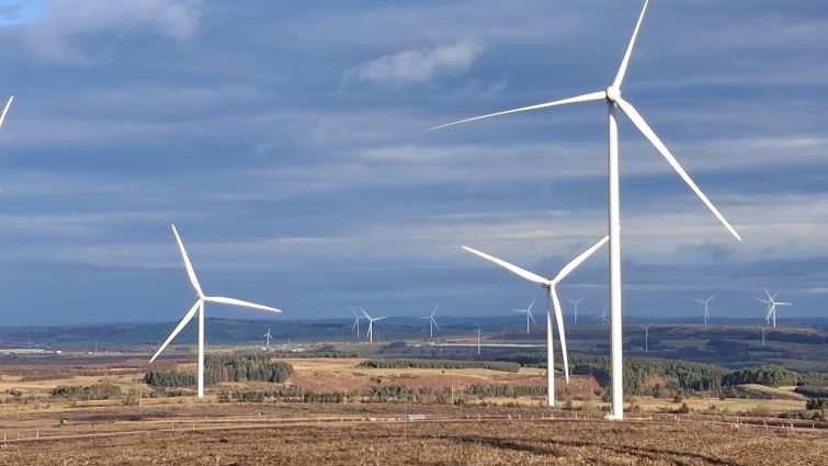 Wind turbines in a rural South Lanarkshire landscape.