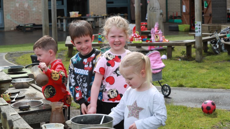 nursery pupils outside