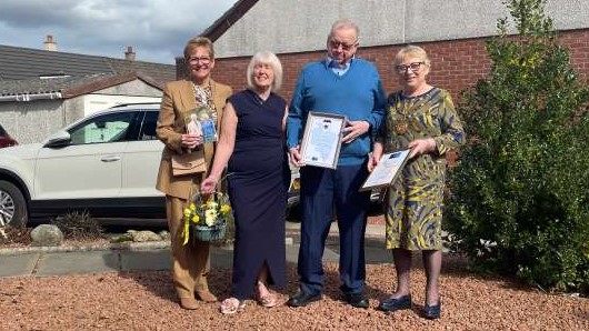 Maureen and George Hutchinson with Provost Margaret Cooper and Deputy Lieutenant for Lanarkshire Linda McDowall