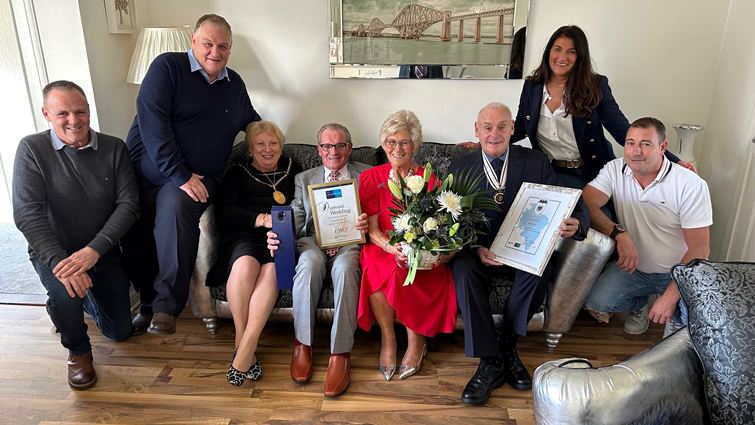 South Lanarkshire Provost Margaret Cooper and Deputy Lord Lieutenant Millar Stoddart congratulate Diamond Wedding Anniversary couple Marion and Eric Ewart and their four children, Henry, Kenneth, Malcolm and Linda.
