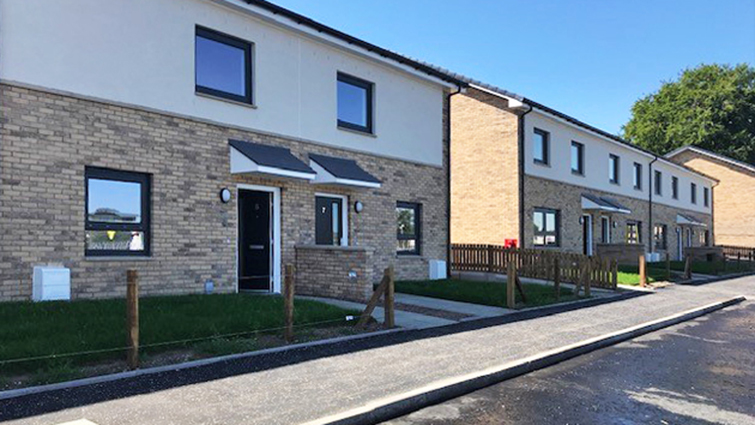 This image shows new council housing in Law